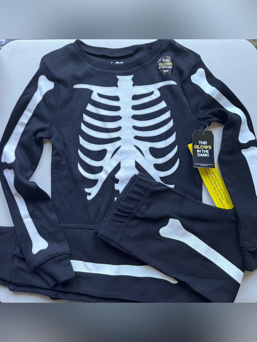 New Disguise Black & White Glow Skeleton Kids Costume Set, size 10